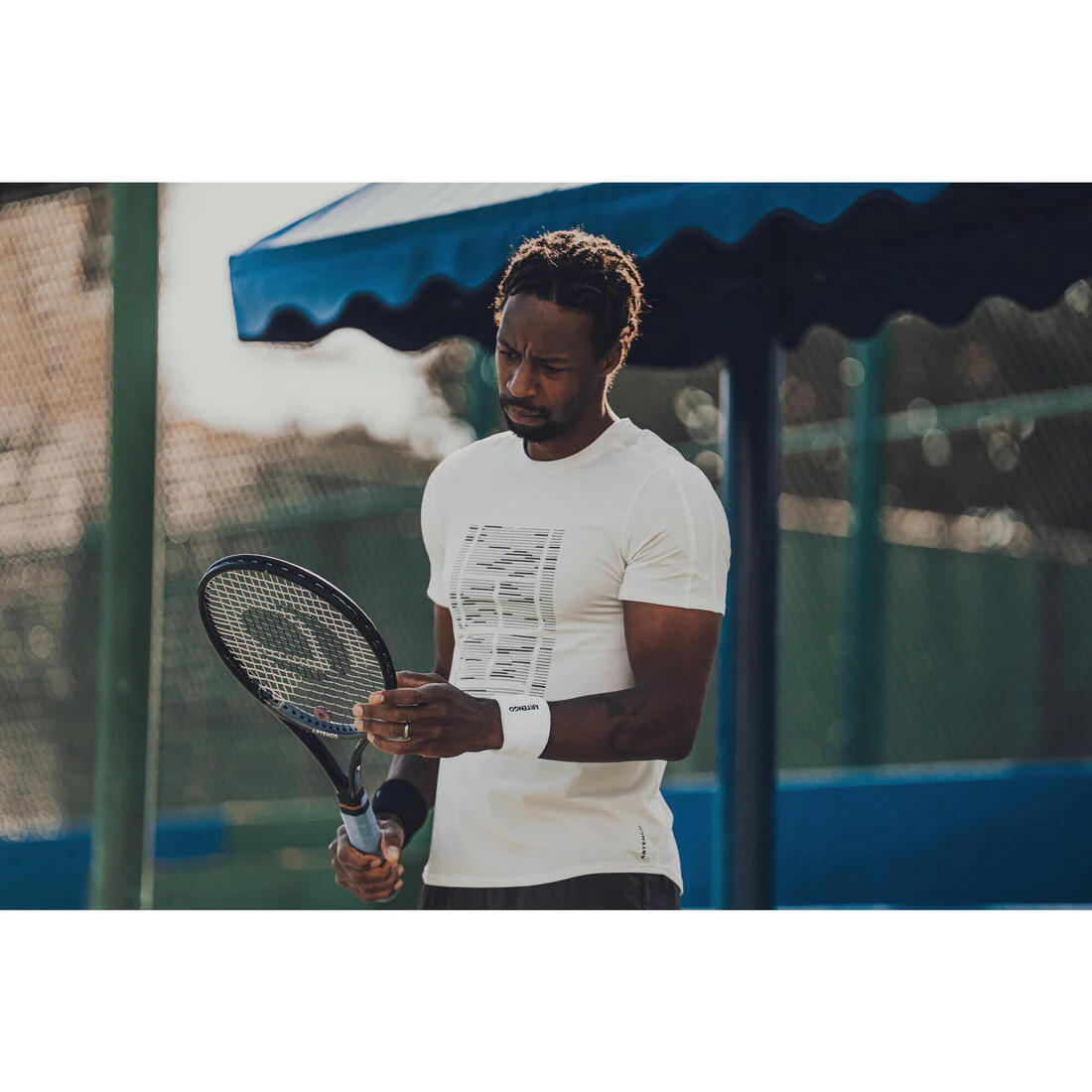 POLERA TENIS HOMBRE KUIKMA TTS SOFT BLANCO ROTO - Image 9