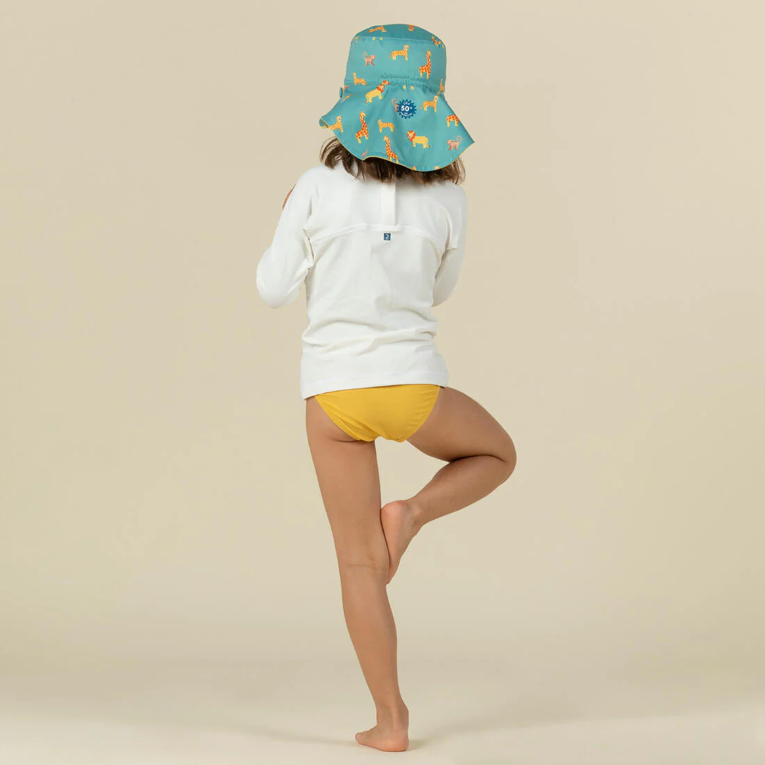 Sombrero bebé filtro UV reversible amarillo azul con estampado selva - Image 4